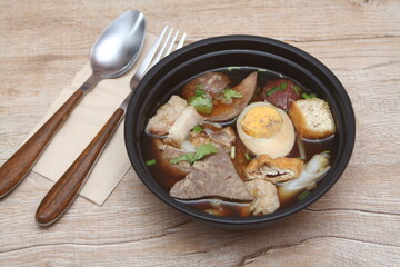 Rolled Rice Noodles in Five-spices Broth or Crunchy Pork Soup, what we call 