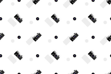 Seamless pattern from old cameras .Background on the theme of photography and photographic equipment. 