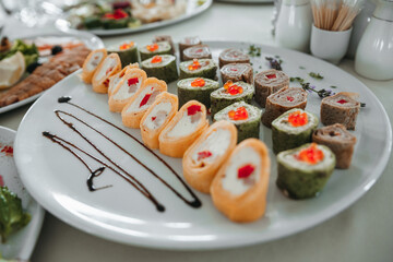 Dessert on the table. Wedding desserts. Wedding table. Serving. Cakes. Fruits. Food