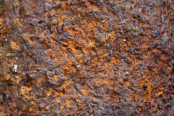 A close-up of rusting metal on a junkyard
