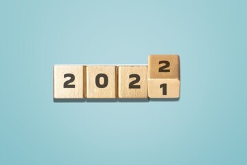 Wooden cube block for 2022 on background , preparation for merry Christmas and happy new year