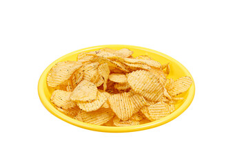 corrugated potato chips on a yellow plate isolated on white background. side view