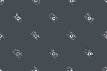 Seamless pattern from old drawn cameras. Background on the theme of photography and photographic equipment.