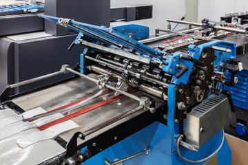 folding equipment in modern printing house