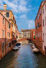 Fototapeta na wymiar View of Rio San Pantalon, a characteristic Venice canal with old traditional and colorful houses in the quiet San Polo District