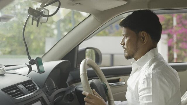 Cab driver using map navigation or gprs on mobile phone for travelling - cocnept of technology, application, smartphone and internet connection