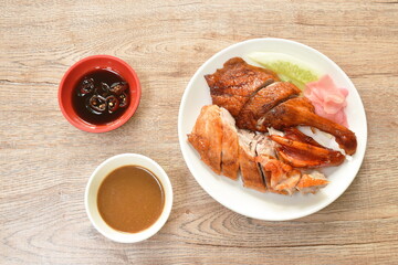 roasted duck meat and pickled ginger dressing sweet soy sauce on plate