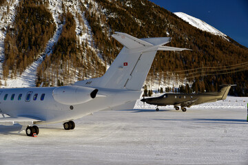  Private jets and aircrafts in the airport of Engadine St Moritz in winter time