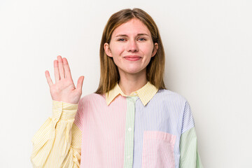 smiling cheerful showing number five with fingers.