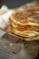 Thin pancakes. Shrovetide holiday on the table. High quality photo