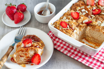 Homemade pudding made by leftovers bread and strawberries