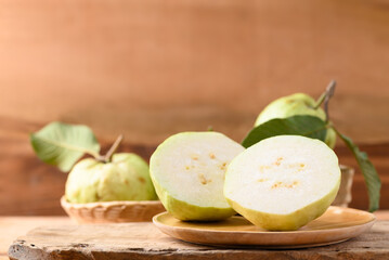 Fresh organic guava fruit on wooden background, Tropical fruit
