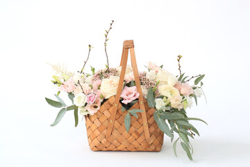  beautiful floral arrangement in a wicker basket