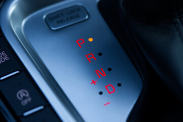 Obraz premium Automatic Car gear position control panel and the gear lever at parking position.