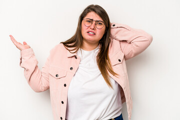 Young caucasian overweight woman isolated on white background screaming with rage.