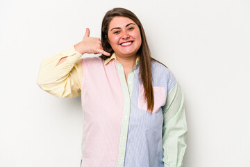 Young caucasian overweight woman isolated on white background showing a mobile phone call gesture with fingers.