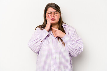 Young caucasian overweight woman isolated on white background having a strong teeth pain, molar ache.
