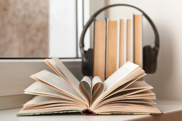 Fototapeta na wymiar Reading Books, Listening Audiobooks concept. Online Education. Self Learning.
