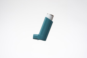 Asthma inhaler, generic, non-branded. Close up studio shot, isolated on white background