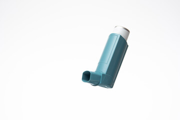 Asthma inhaler, generic, non-branded. Close up studio shot, isolated on white background