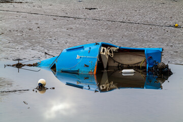 PORTGORDON,MORAY,SCOTLAND - 13 FEBRUARY 2022: This is a small boat that has sunk and started to...