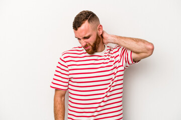 Obraz premium Young caucasian man isolated on white background suffering neck pain due to sedentary lifestyle.