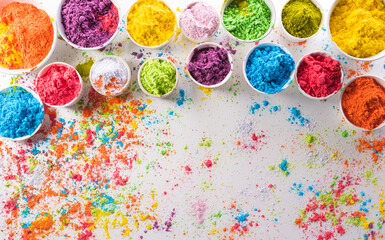 Happy Holi decoration, the indian festival.Top view of colorful holi powder on white background.
