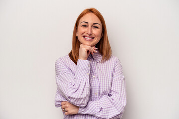 Young caucasian woman isolated on white background smiling happy and confident, touching chin with hand.