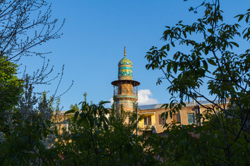 Fototapeta na wymiar View of the minaret of the historic 