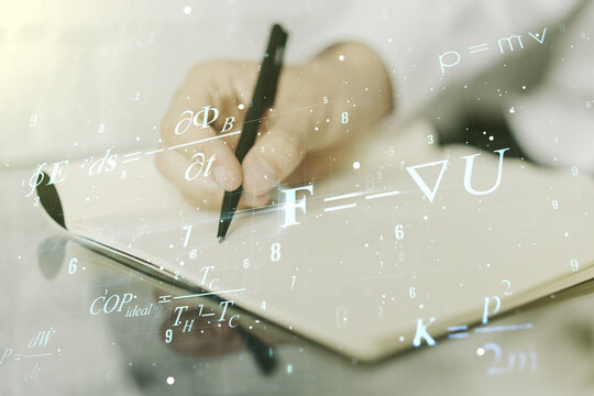Creative scientific formula concept with man hand writing in notebook on background. Multiexposure