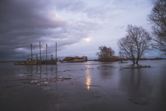 A House Standing In The Water In The Village, A Flooded House