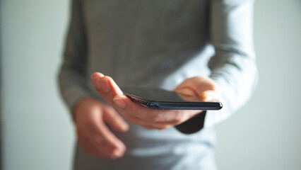 the business man using smartphone