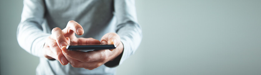 the business man using smartphone