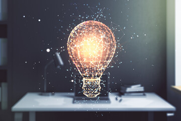 Double exposure of creative light bulb hologram and modern desktop with laptop on background,...