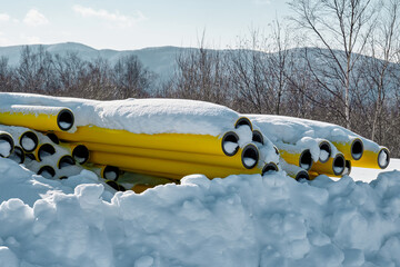 Natural gas pipes under the snow.