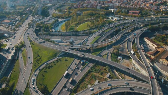 Aerial view of rush hour on highway interchange during the day