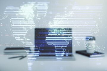 Multi exposure of abstract creative digital world map on modern laptop background, tourism and traveling concept concept