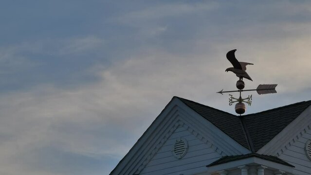 Clouds moving timelpase eagle weather vane