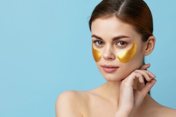 young woman skin care face patches bare shoulders hygiene close-up Lifestyle
