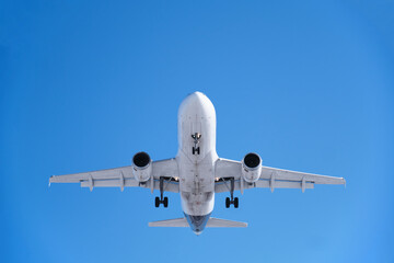 Close up of airplane in the blue sky