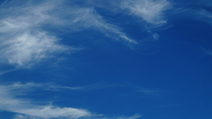  amazing blue sky background with a few white clouds  
