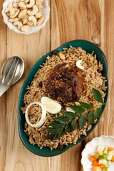 Selective focus A plate of Lamb Mandy rice served with acari and raisin