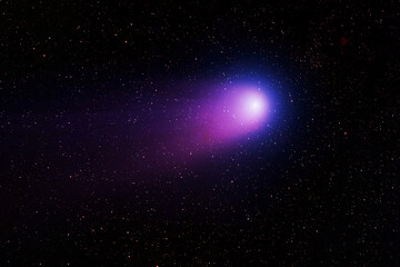 Comet in space. Elements of this image furnished by NASA