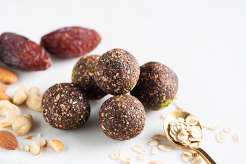 Homemade energy balls, healthy vegan truffles made with dates, oats and nuts