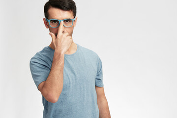 handsome man in blue t-shirt glasses gesture hands smile emotions cropped view
