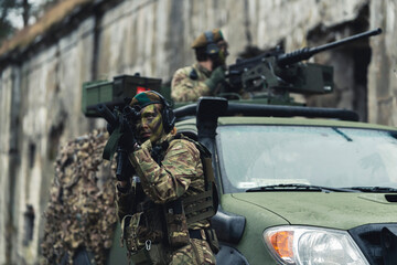 Cowardly rifle firing pose suppressing enemy . High quality photo