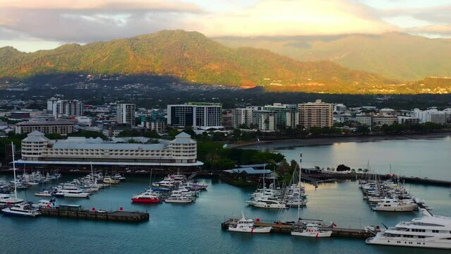 Aerial View of Harbor and Marina in Cairns, Queensland, Australia at Sunrise - drone shot