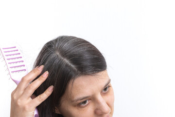 A young woman with gray hair. Early gray hair concept