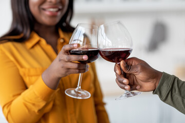 Cheers. Closeup Shot Of Young African American Couple Drinking Wine, Clinking Glasses