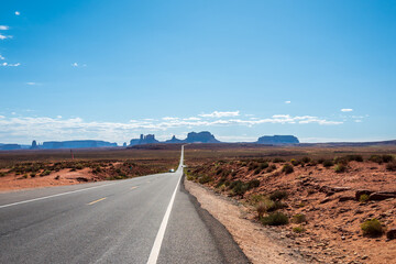 road in the desert to monument valley